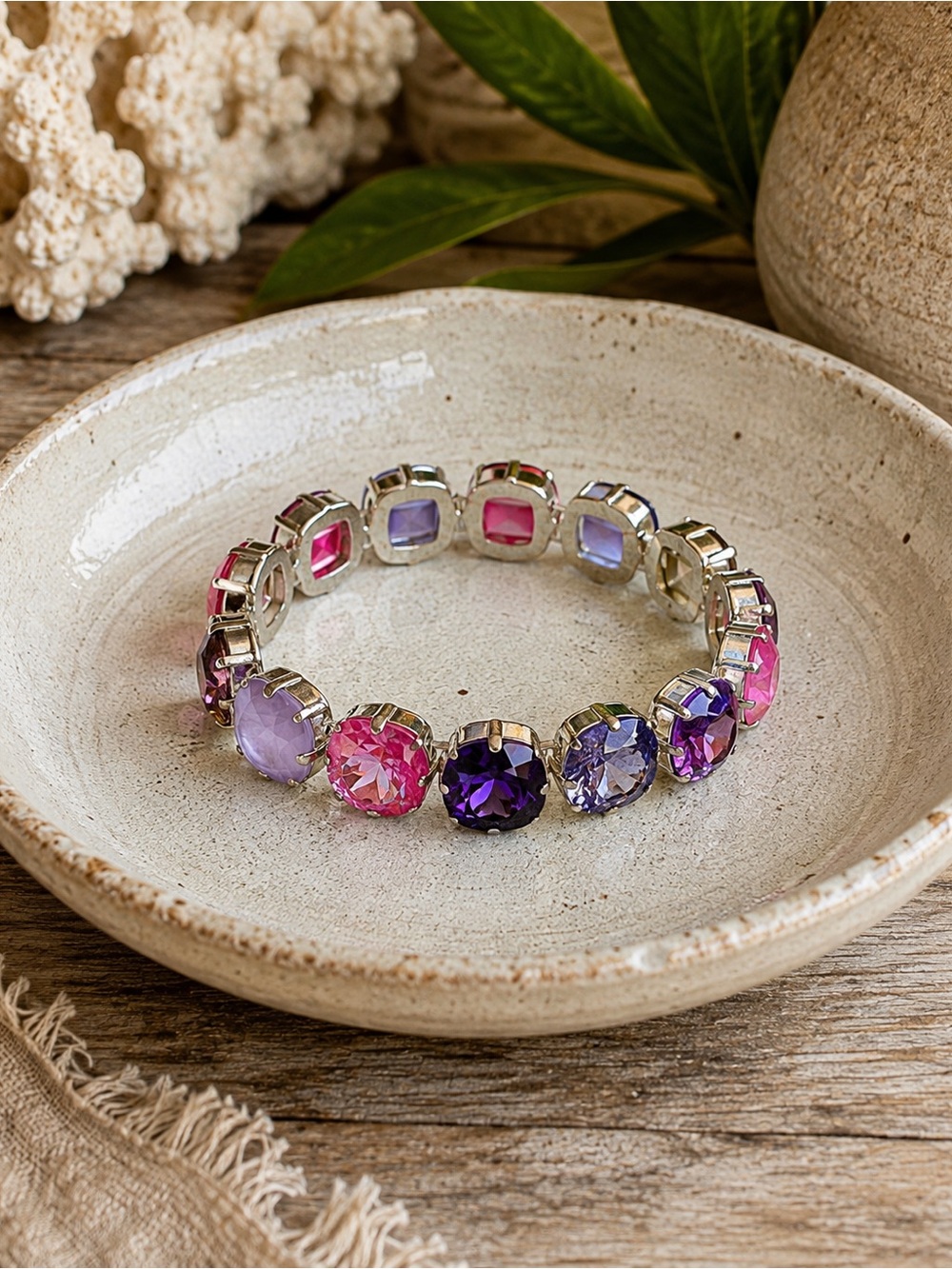 Handcrafted statement bracelet with Swarovski crystal pinks and purples